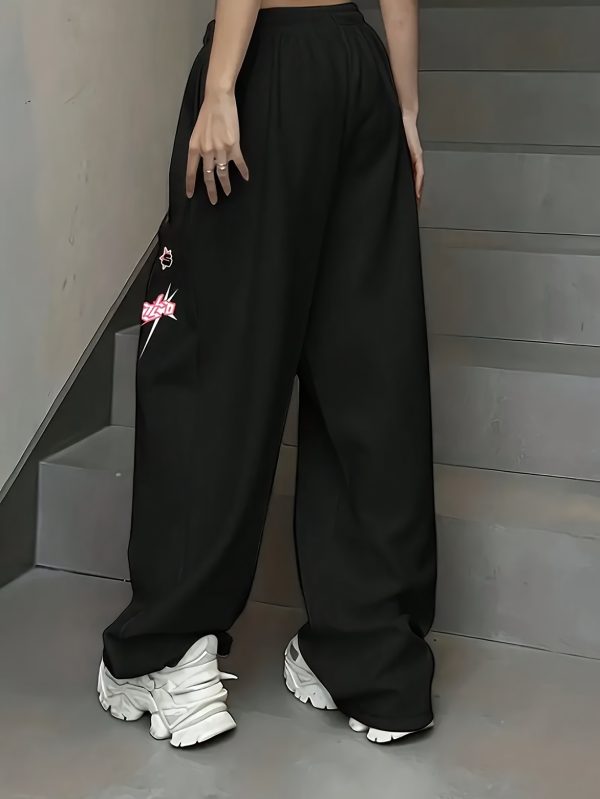 女士時尚黑色寬腿褲，粉紅色幾何「veronica」印花 優雅高腰抽繩設計，聚酯纖維和氨綸混紡，可機洗 時尚全季街頭服飾