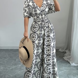 女士優雅v領印花連身裙，收腰設計，短泡泡袖和流暢寬腿 适合春夏度假，聚酯面料，印花圖案，度假服裝|v領連身裙|聚酯連身裙
